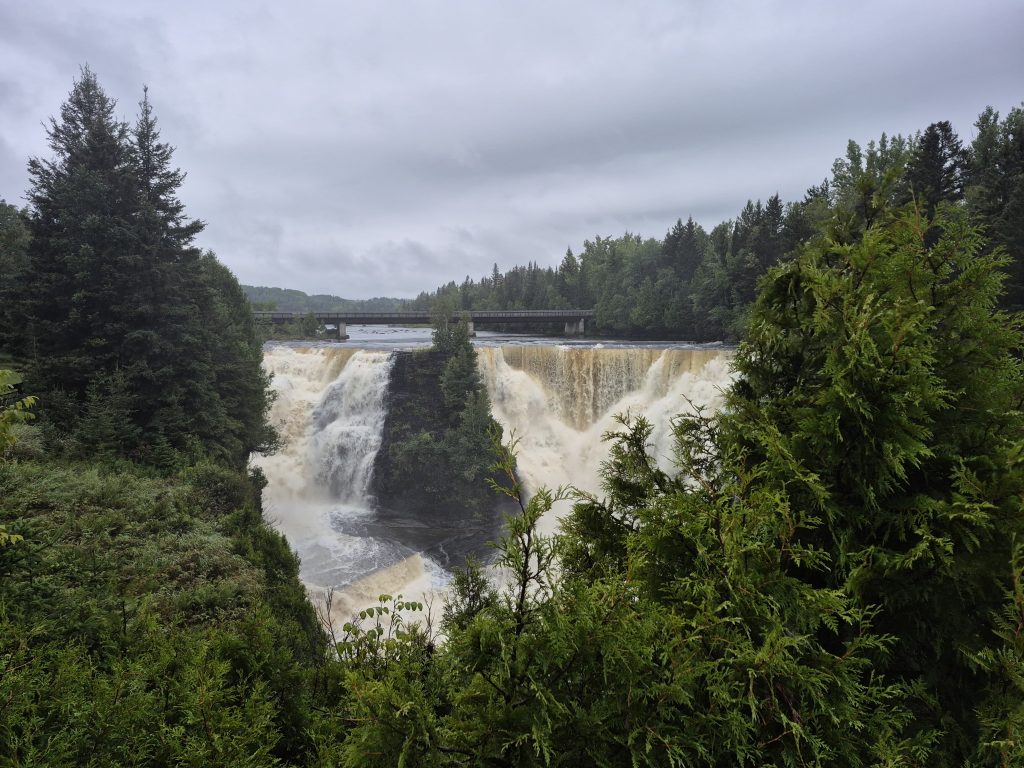 Kakabeka Falls with foliage in foreground 