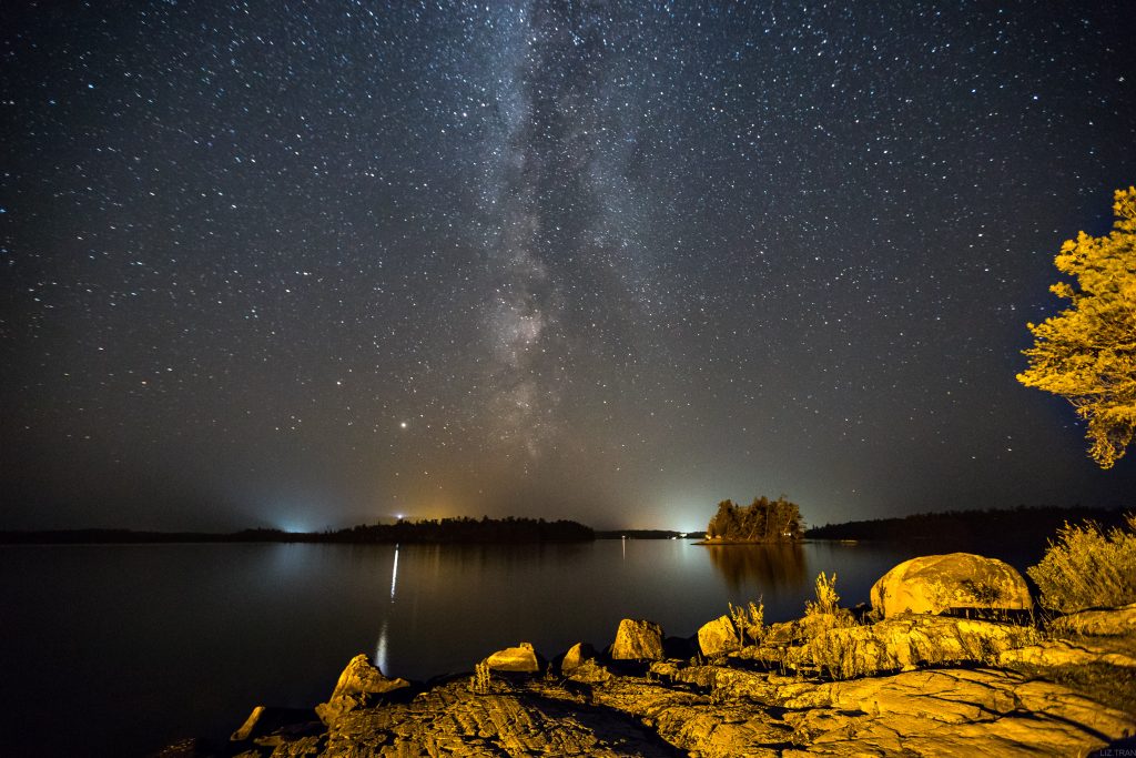 starry sky over lake
