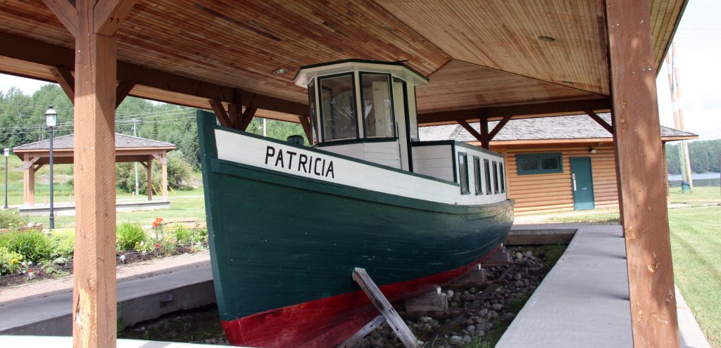 Patricia Tugboat under wooden shelter