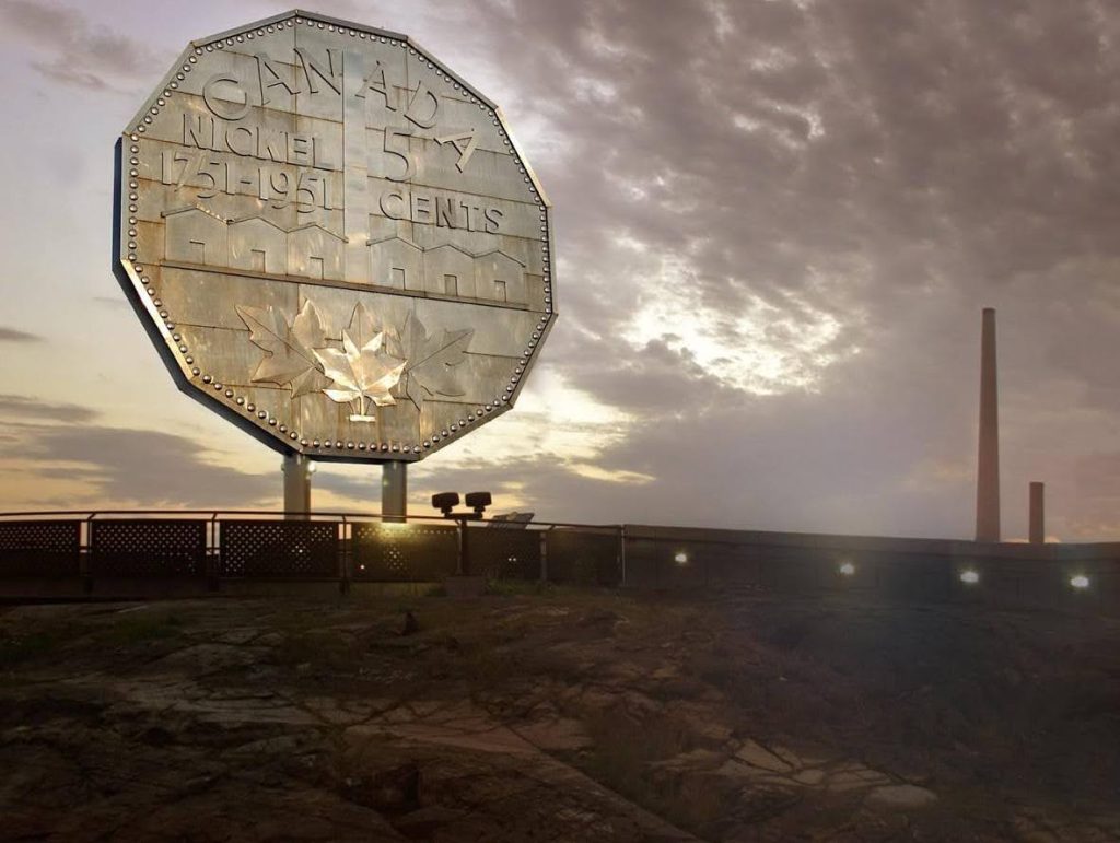 A huge nickel standing on edge 