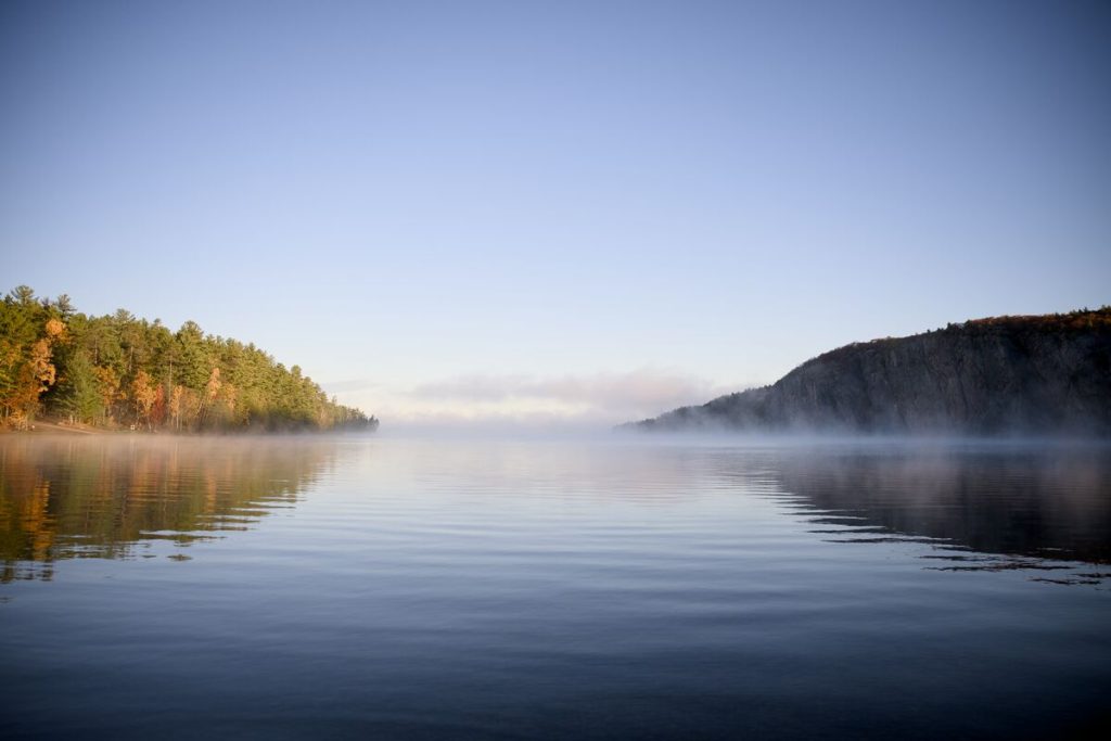 misty lake view in fall
