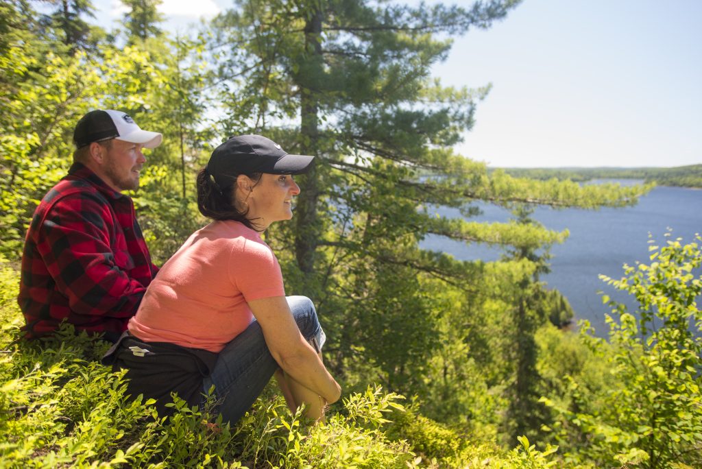 couple looking out at lake 