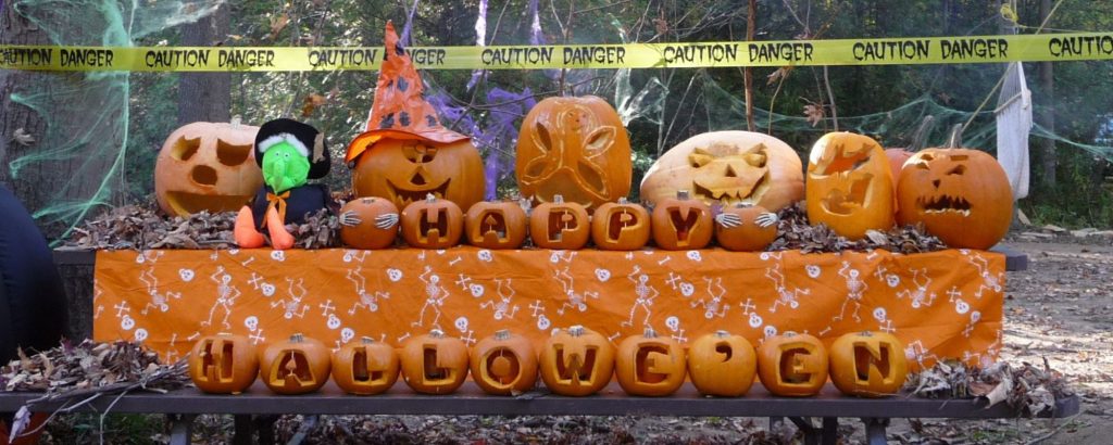 pumpkins and halloween decor on a campsite